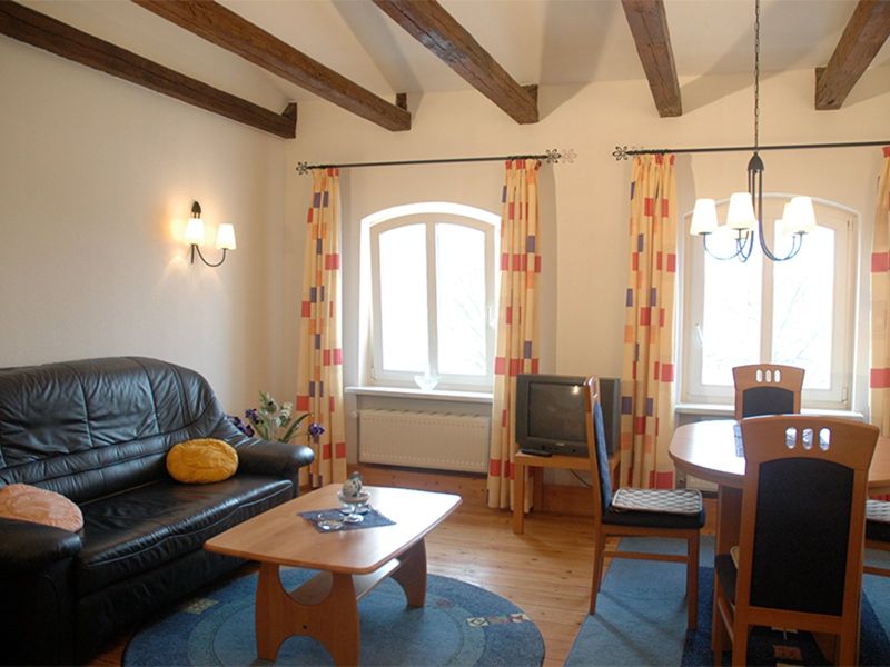 Rostock Ferienwohnungen Haus Astrid: FeWo Leuchtturm (Wohnzimmer)